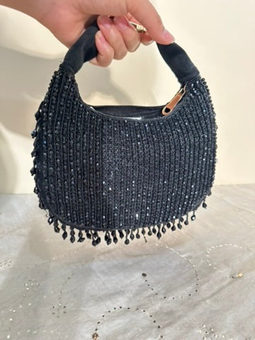 Bolso de borlas con cuentas de cristal hecho a mano